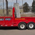 A Donnelly Stucco trailer featuring custom printed exterior from Printastik in Edina, MN.