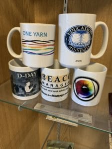 Mugs featuring custom printed logos by Printastik in Edina, Minnesota.