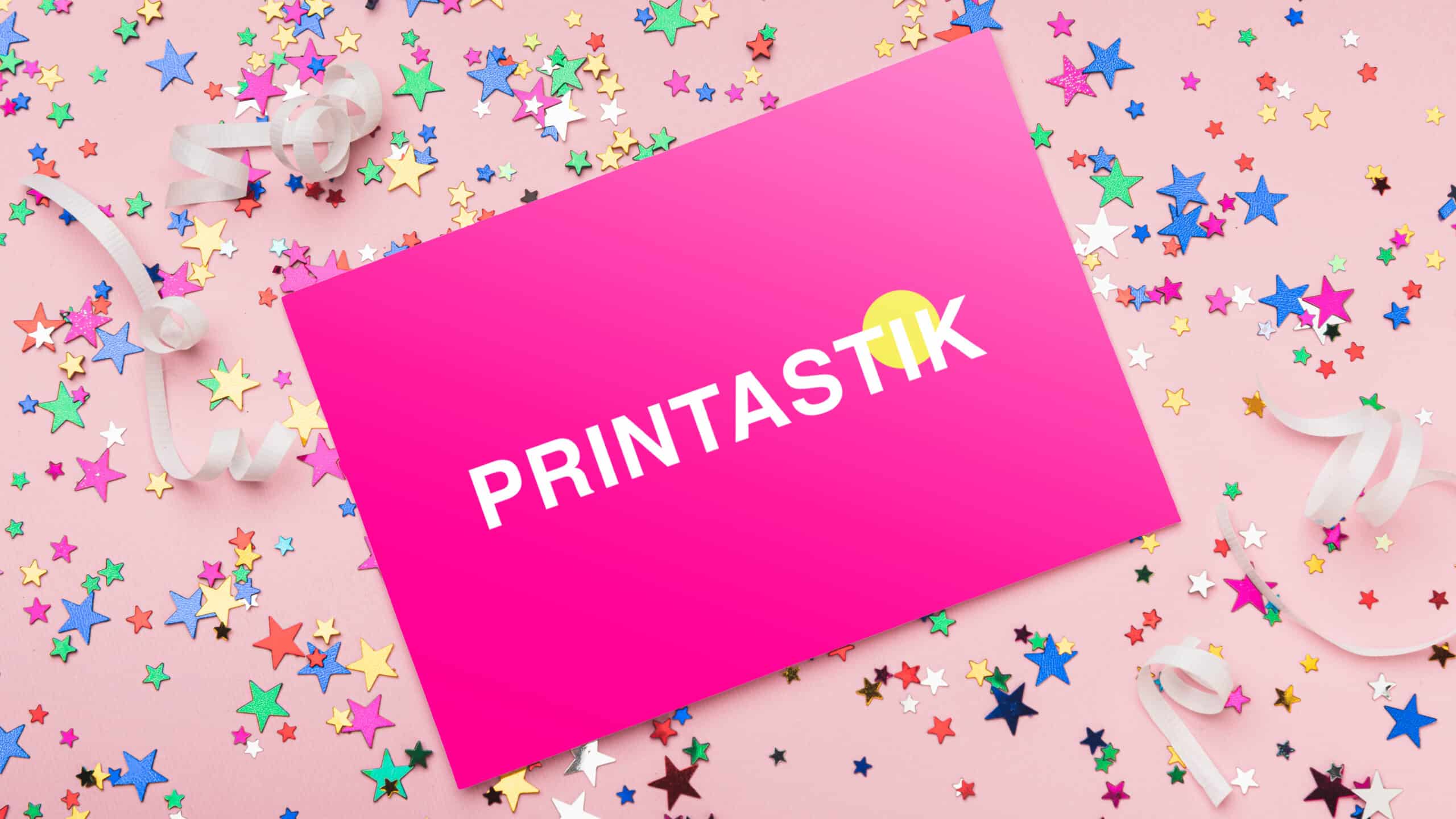 Pink Printastik branded notecard with confetti background
