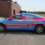 A wrapped RentersWarehouse Car featuring custom printed exterior from Printastik in Edina, MN